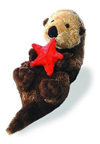 Peluche con forma de nutria agarrando una estrella de mar