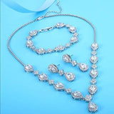 collar y aretes Flor de lágrima zirconia plateada