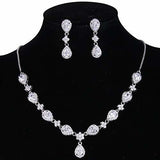 collar y aretes Flor de lágrima zirconia plateada