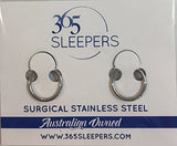 Aretes en forma de aros con bisagra