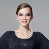 Conjunto de collar y pendientes de perlas y oro